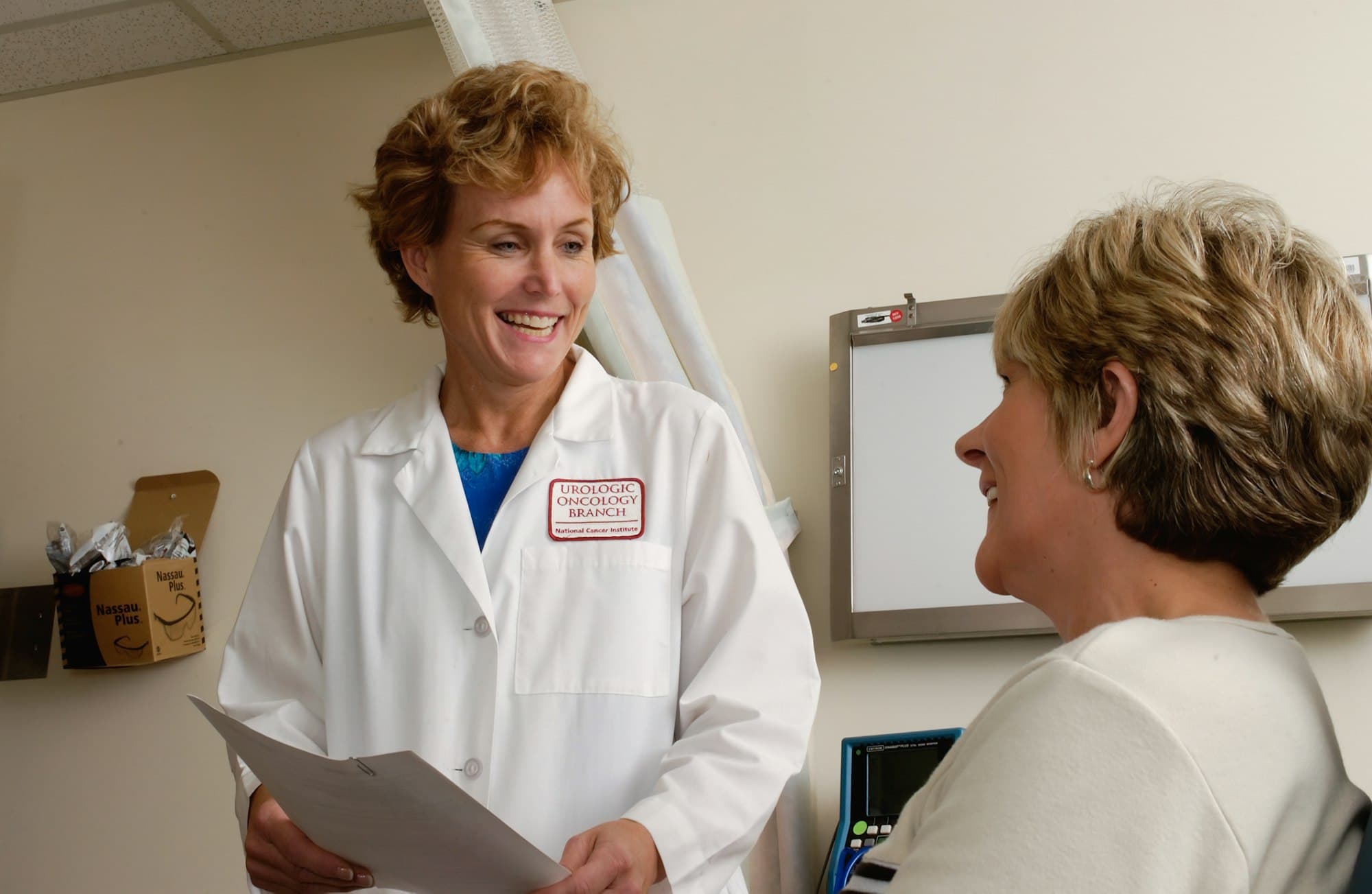 A physician talking with a patient