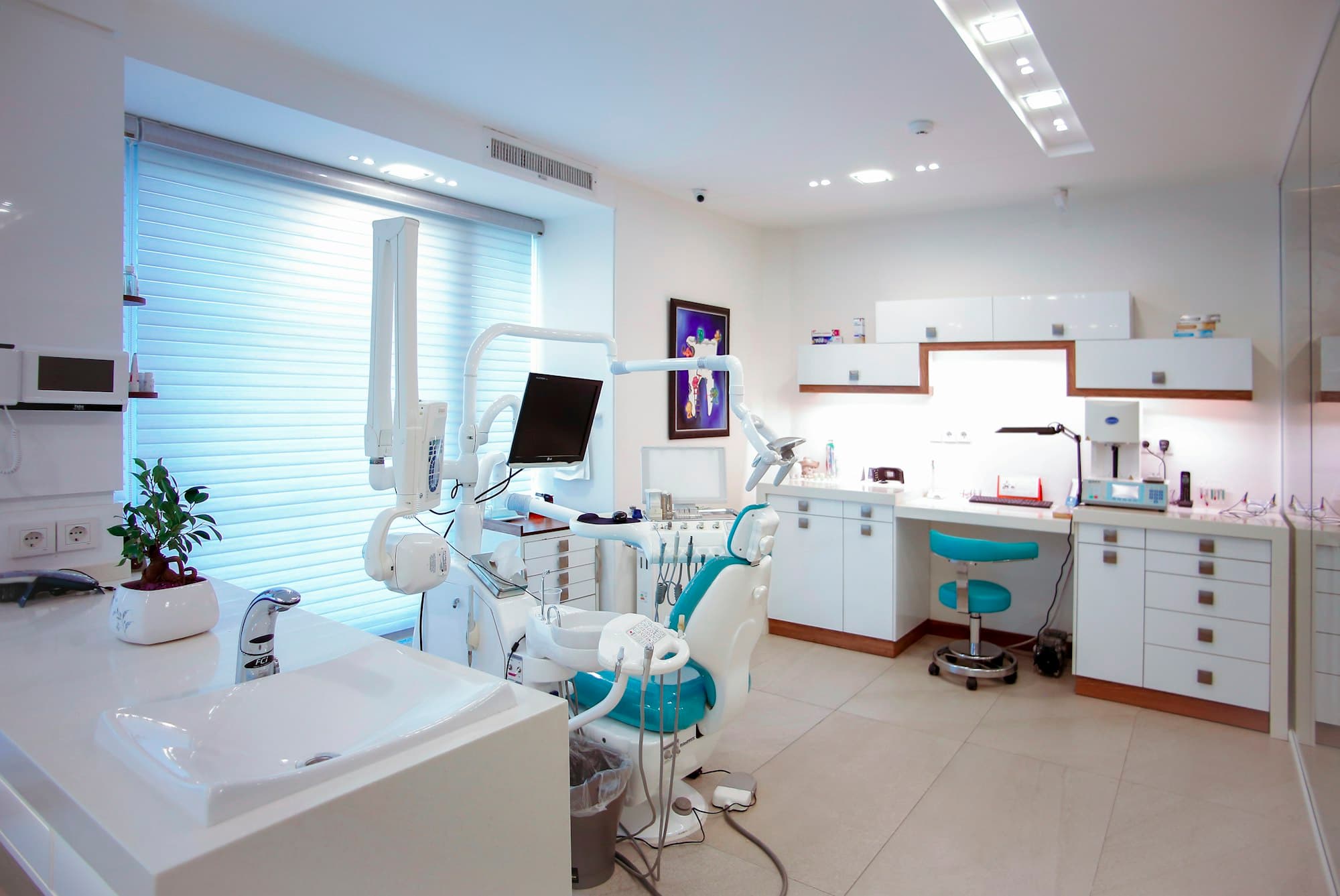 A bright, orderly clinic room with modern equipment